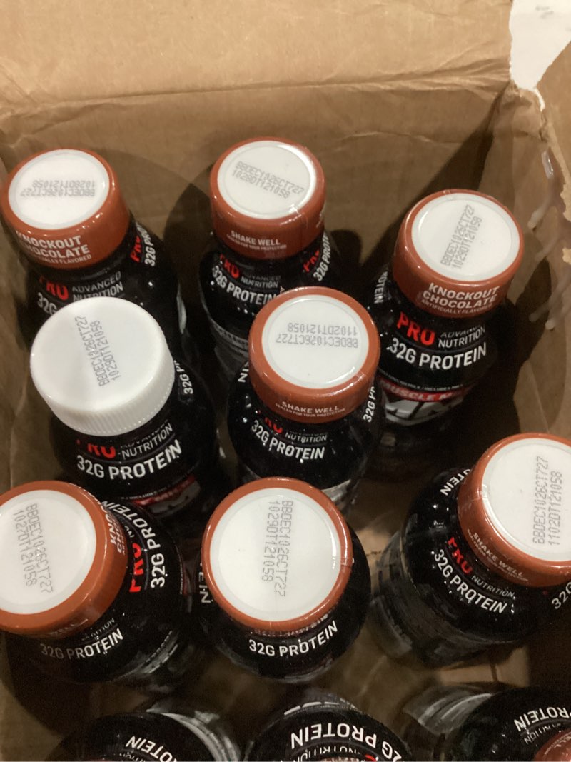 Condition photo showing As Is for muscle milk pro series protein shake, knockout chocolate, 32g protein, 11.16 fl oz (pack of 12) chocolate 11.16 fl oz (pack of 12)