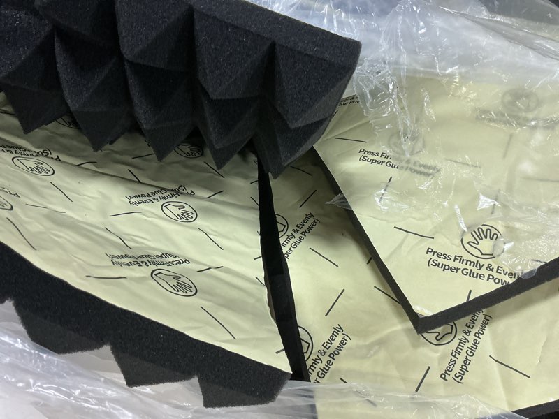 Condition photo showing As Is for 12 pack pyramid sound proof foam panels for walls with updated self-adhesive 2"x12"x12" high density acoustic panels sound absorbing fast-expanding soundproof wall panels for gaming studio decor-black 2 inch 12 pack black