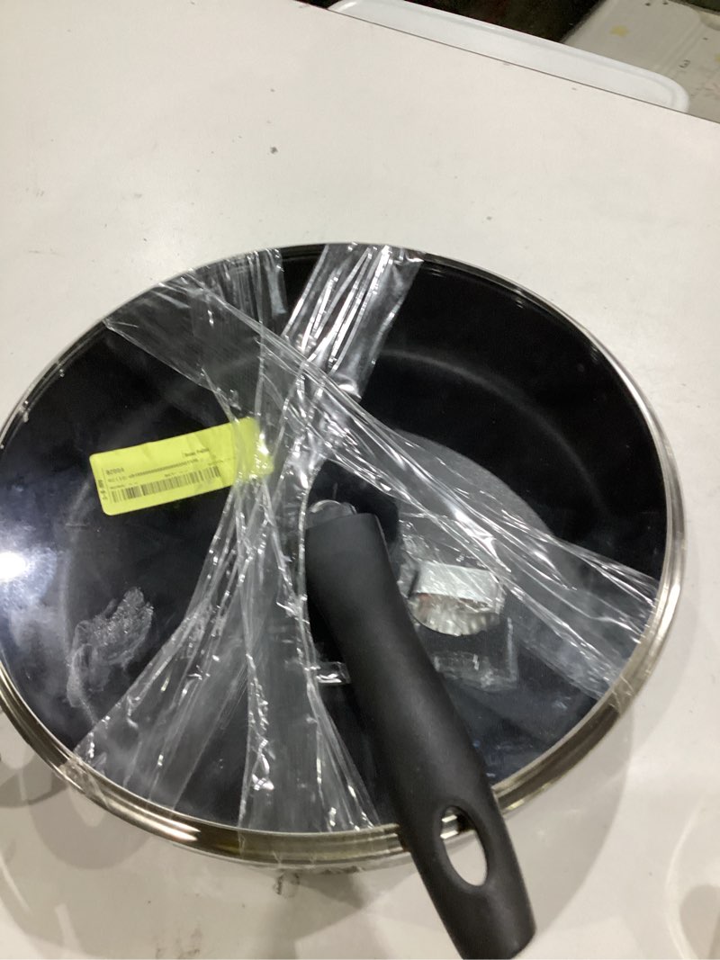 Condition photo showing As Is for mainstays 4-quart non-stick jumbo cooker with glass lid, black