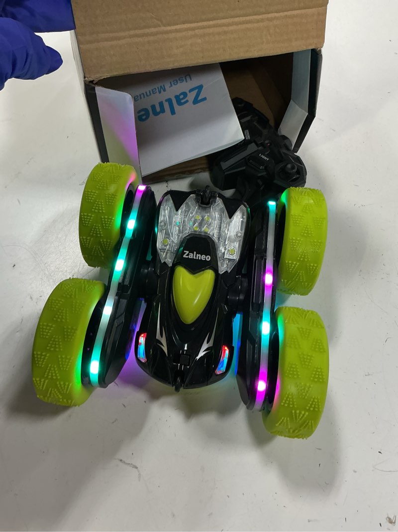Condition photo showing As Is for remote control car – 4wd 360° flip double?sided rc stunt car led light bar & usb?c modular battery, off?road toys for boys ages6?12, birthday gift, black?green black&green