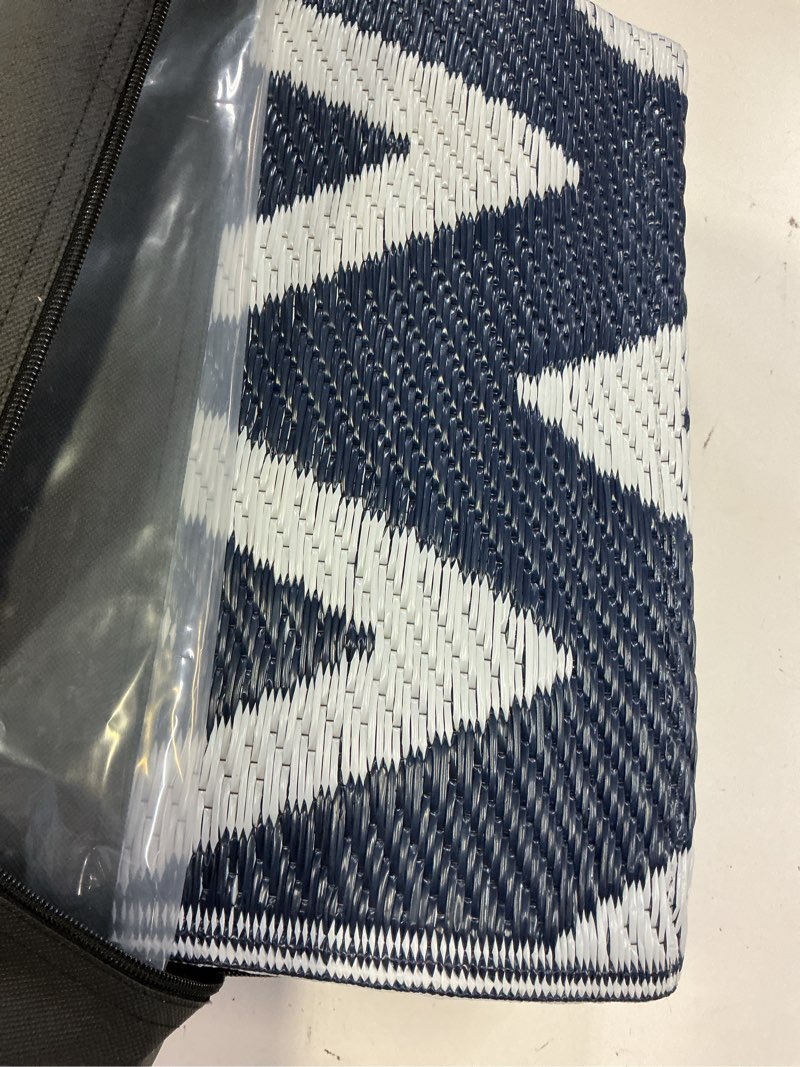 Condition photo showing Good Condition for olanly waterproof outdoor rug 5x8 ft clearance, reversible outdoor plastic straw rug, rv mat, indoor outdoor carpet for patio, camping, balcony, deck, backyard, navy & white navy blue & white chevron 5' x 8' (rectangular)