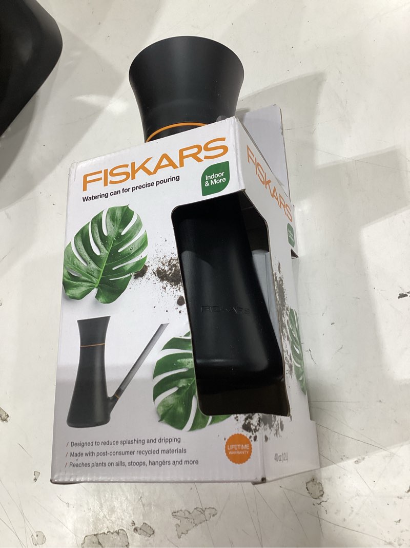 Condition photo showing Good Condition for fiskars indoor watering can, long reach spout for precision hydration on house plants, flowers & garden, anti-drip nozzle with translucent volume markings, ergonomic recycled plastic body, 40 oz