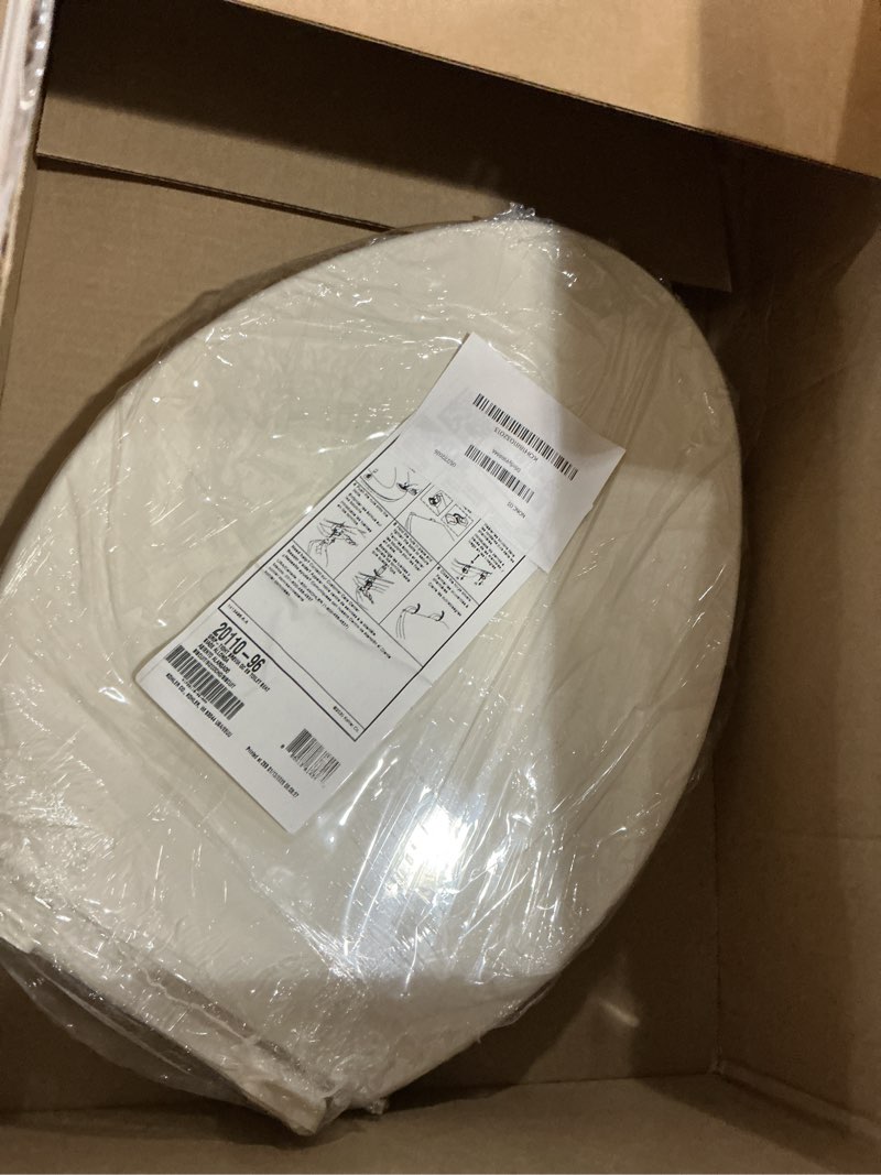 Condition photo showing New/Like New for kohler 20110-96 brevia, slow close toilet seat, elongated toilet seat, grip-tight bumpers quick-attach hardware, biscuit biscuit elongated quiet-close