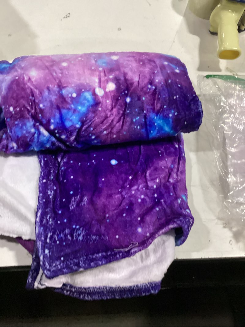 Condition photo showing As Is for purple galaxy fleece throw blanket 50 x 60 inches for couch sofa bed,super soft cozy plush microfiber flannel blanket lightweight for women, men and kids purple galaxy throw 50x60inch