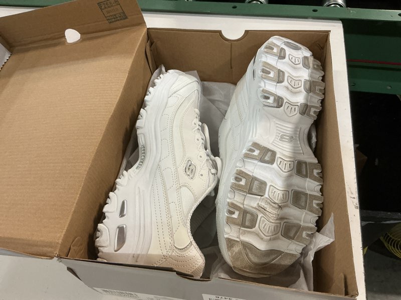 Condition photo showing As Is for skechers women's d'lites fresh start memory foam lace-up sneaker 9 wide white/silver