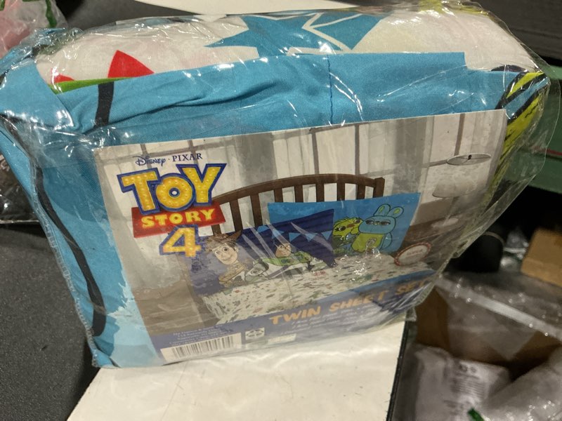 Condition photo showing Good Condition for jay franco disney toy story kids twin sheet set 3 piece - super soft microfiber bedding, reversible, deep pocket, fade resistant, machine washable, woody buzz lightyear (official disney product) white - toy story 3 piece twin