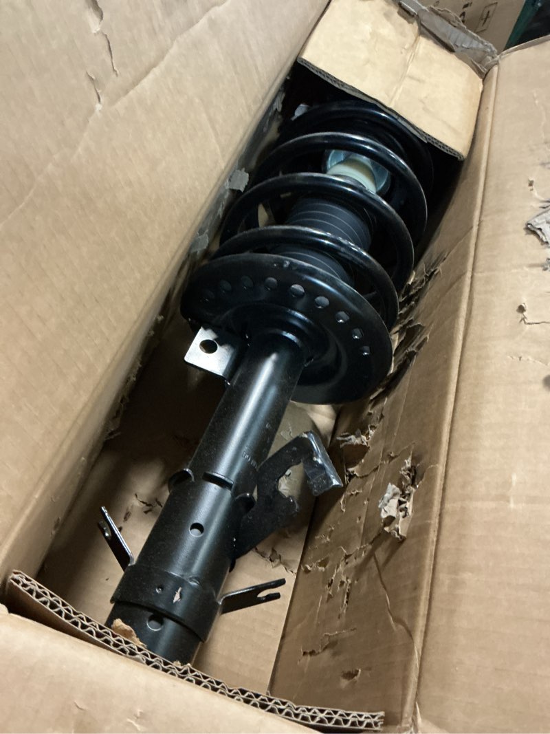 Condition photo showing Good Condition for monroe quick-strut 471128r suspension strut and coil spring assembly for chrysler town & country