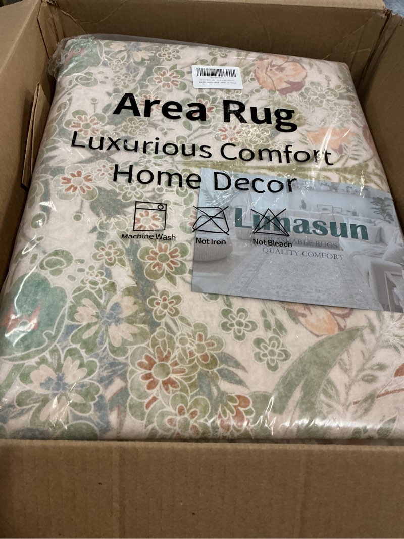 Condition photo showing New/Like New for rug