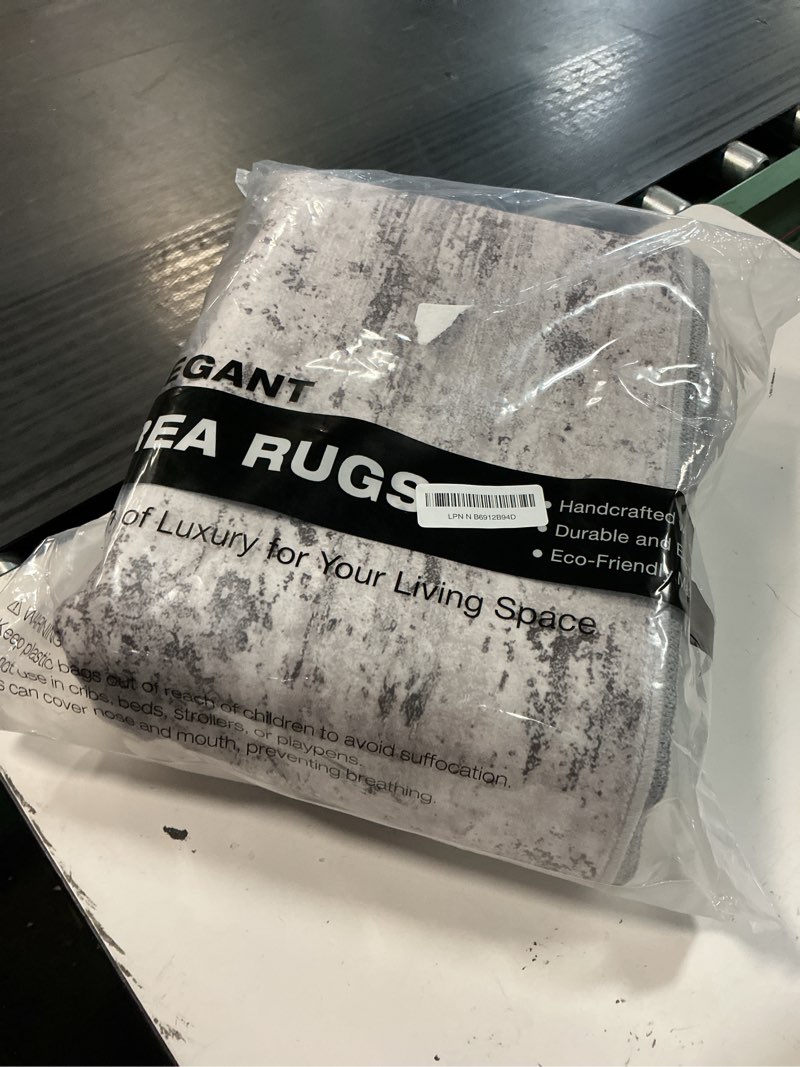Condition photo showing Good Condition for cochyean abstract area rugs - washable 5x7 rug for living room, stain resistant, non-slip backing for bedroom, bathroom, kitchen (light gray, 5'x7') light gray 5' x 7' (rectangular)