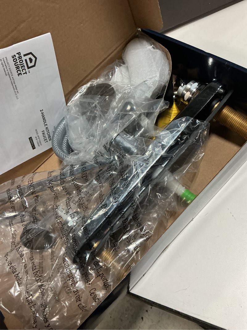 Condition photo showing As Is for project source dover chrome double handle kitchen faucet (deck plate and side spray included)