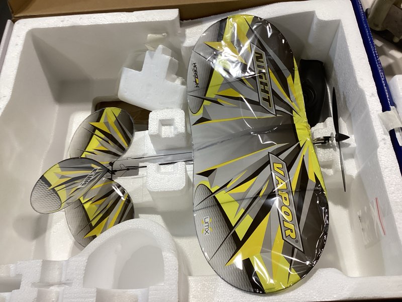 Condition photo showing As Is for no battery or charger e-flite rc airplane umx night vapor rtf to fly is included with as3x and safe select eflu1300 ready-to-fly
