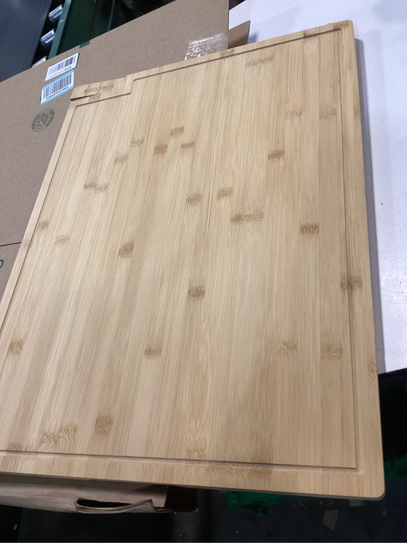 Condition photo showing Good Condition for kikcoin bamboo cutting boards for kitchen, 3xlarge wood cutting board with rotating kickstand & juice groove, wooden chopping board for meats veges fruits, heavy duty serving tray, 24 x 18 inch 24"l x 18"w 1