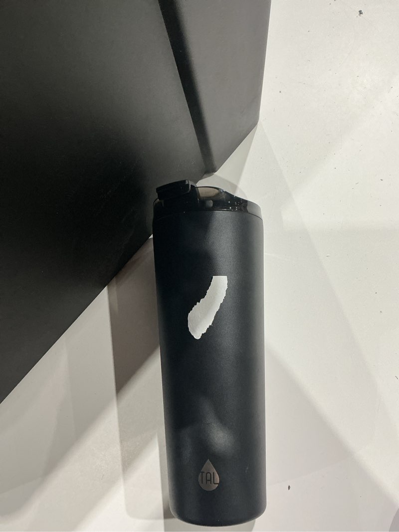 Condition photo showing As Is for best sellers in travel cup with lid and straw