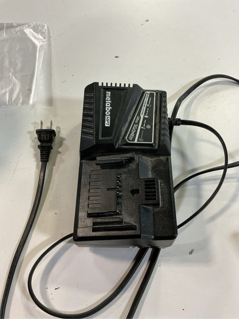 Condition photo showing As Is for 18v lithium ion charger | metabo hpt uc18yfsl