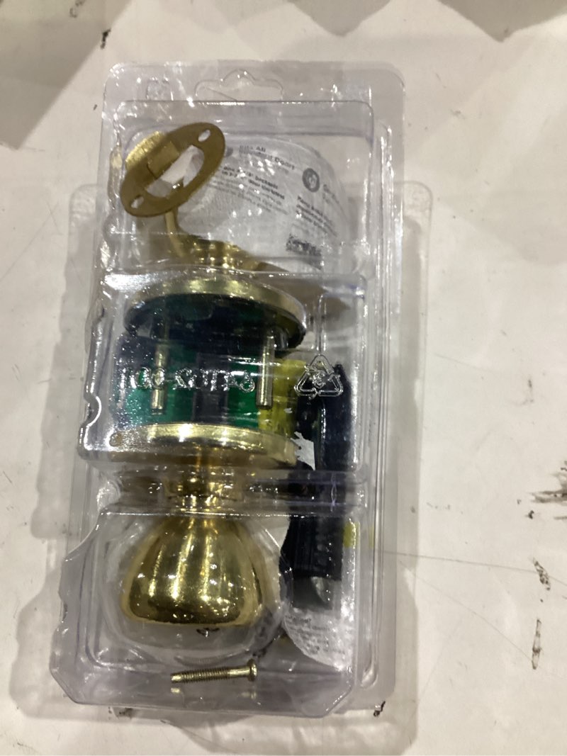 Condition photo showing As Is for mobile home polished brass hall/closet door knob with microban antimicrobial technology