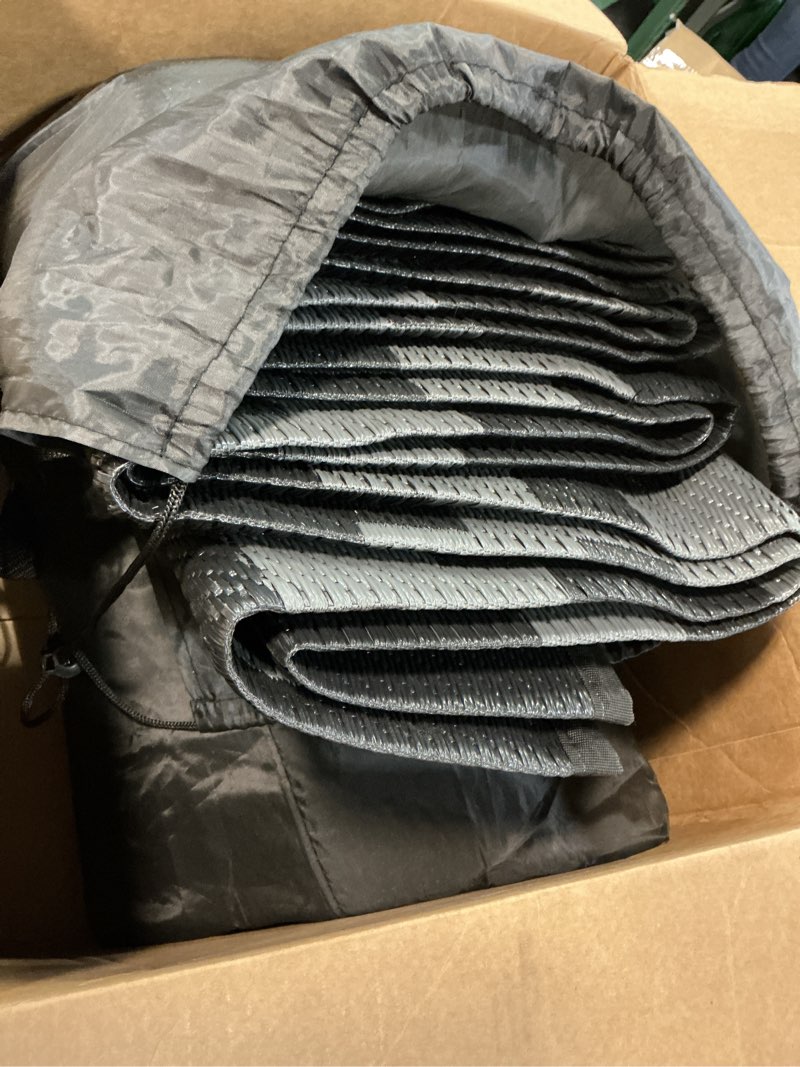 Condition photo showing Good Condition for genimo outdoor rug waterproof, 10' x 10' reversible plastic straw rug, lightweight large rv camping mat for patio, deck, camper, balcony, backyard, picnic, black & gray black&gray 10' x 10' (square)