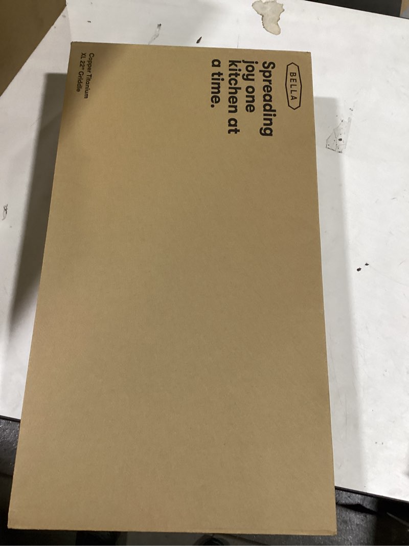 Condition photo showing New/Like New for bella XL Electric Ceramic Titanium Griddle, Make 15 Eggs At Once, Healthy-Eco Non-stick Coating, Hassle-Free Clean Up, Large Submersible Cooking Surface, 12" x 22", Copper/Black 12" x 22" Copper