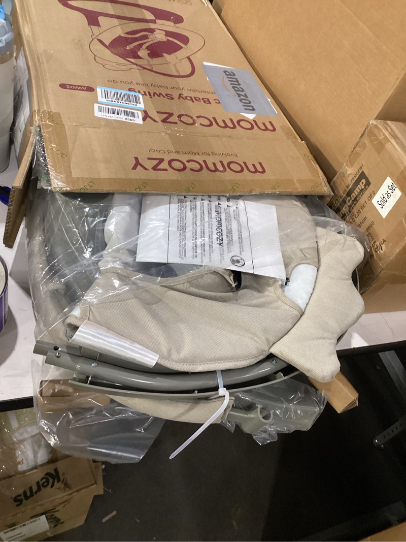 Condition photo showing New/Like New for momcozy 2-in-1 electric baby swing, dual-arm support system & parent-inspired motions, convertible to toddler seat up to 66 lbs, adjustable height, lightweight, khaki