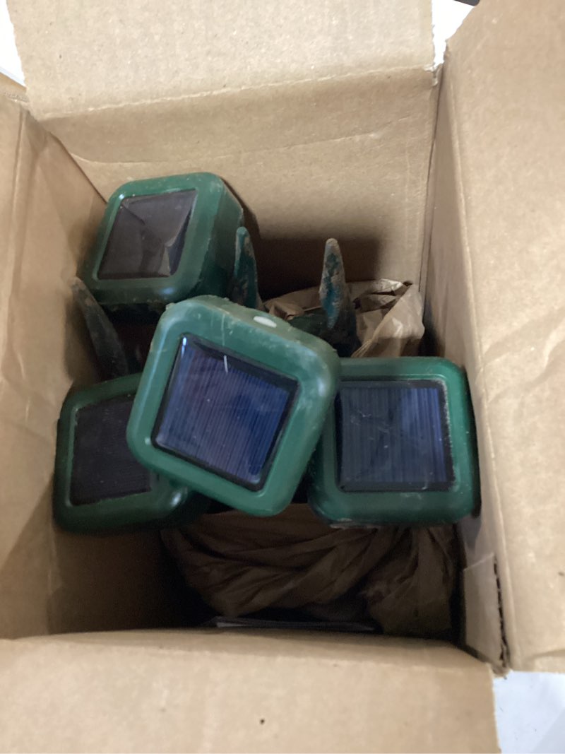 Condition photo showing As Is for mole repellent solar powered ip 65 waterproof