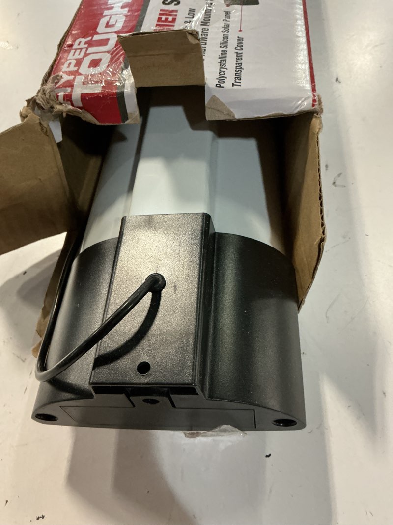 Condition photo showing As Is for hyper tough 1000 lumen solar slim led shop light