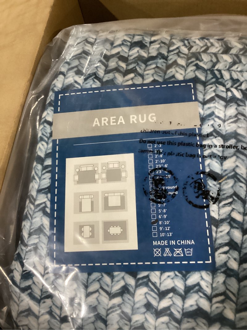 Condition photo showing New/Like New for area rug 8x10
