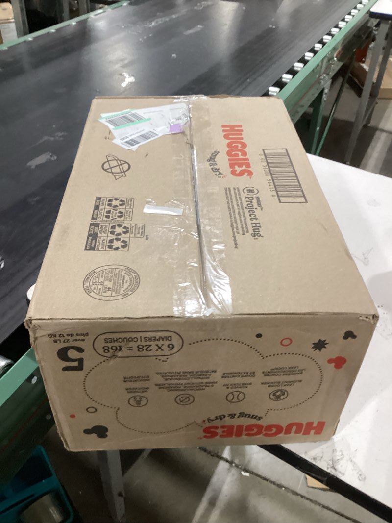 Condition photo showing New/Like New for Huggies Size 5 Diapers, Snug & Dry Baby Diapers, Size 5 (27+ lbs), 168 Count (6 Packs of 28), Packaging May Vary Size 5 168