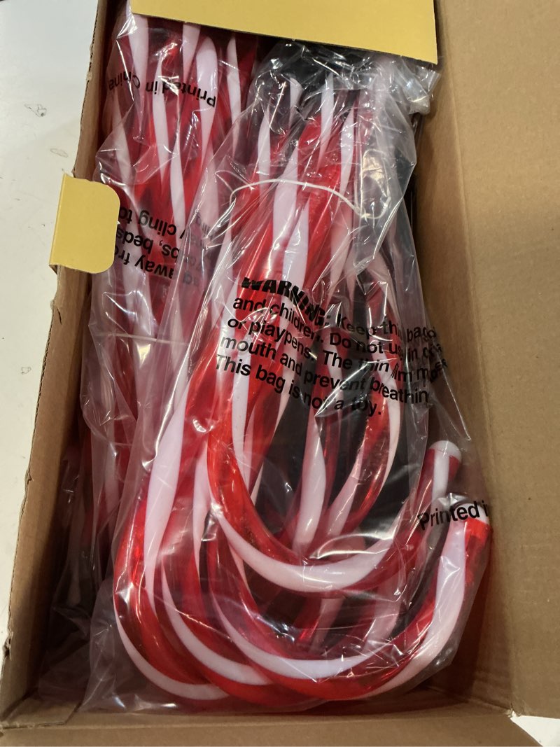 Condition photo showing New/Like New for ideaals 24-pack solar christmas candy cane lights, solar pathway lights waterproof, christmas decorations outdoor with 8 modes for party patio garden lawn yard decor