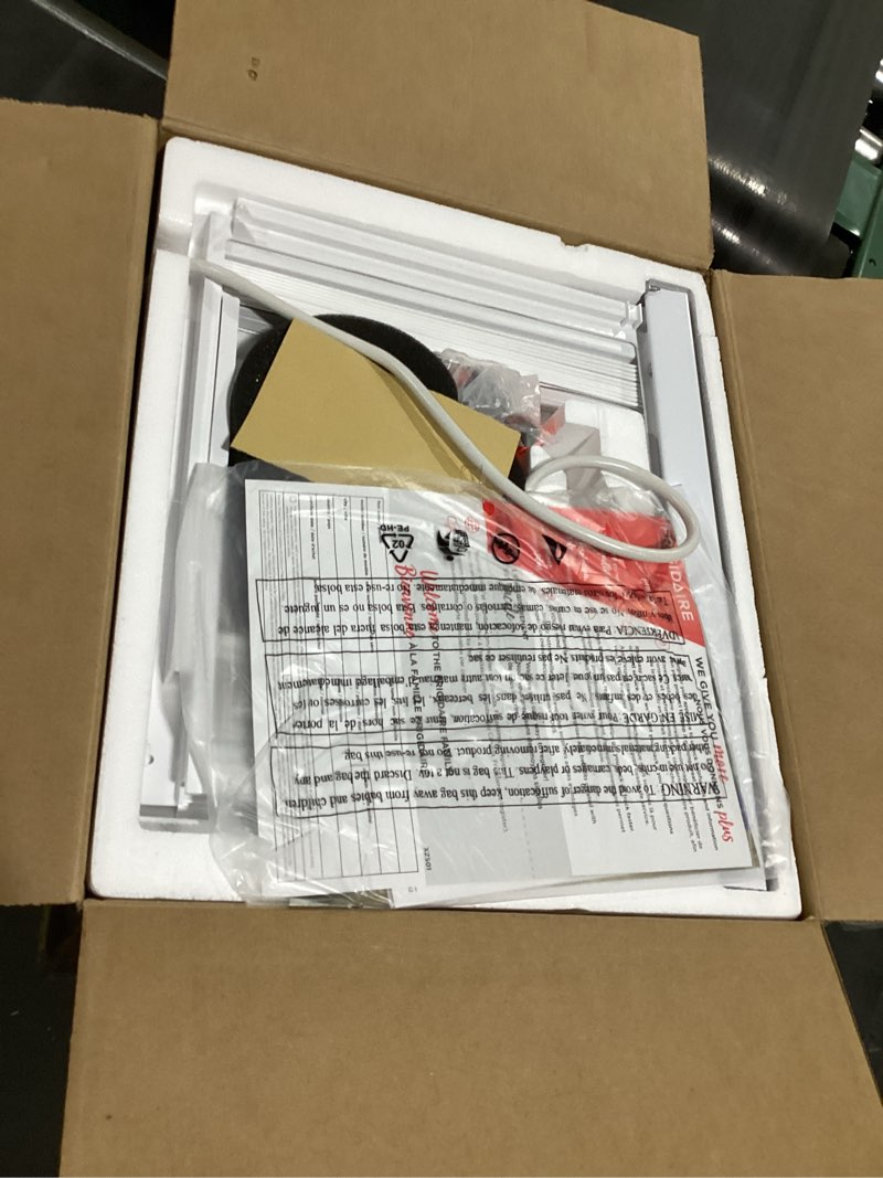 Condition photo showing New/Like New for frigidaire 5,000 btu window-mounted air conditioner, cools up to 150 sq. ft., quiet operation, effortless temperature control, 2 fan speeds, auto restart, white 5,000 btu mechanical controls