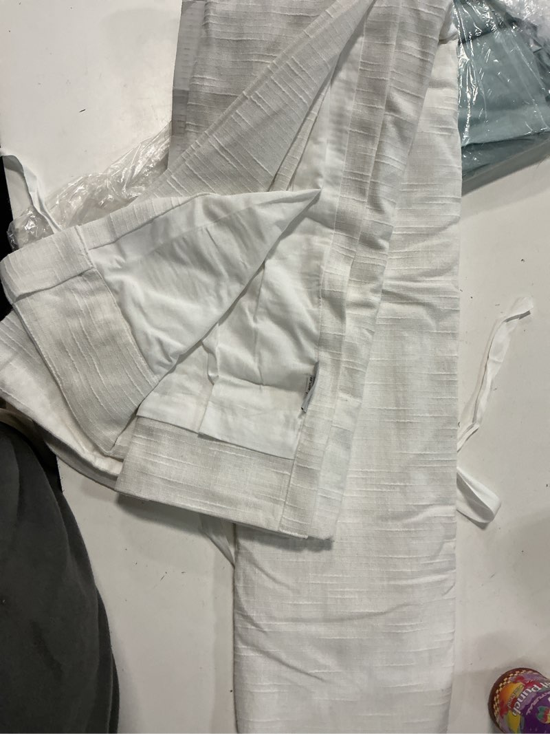 Condition photo showing Good Condition for cotton slub room darkening curtain - single panel color: white size: 48x108 lining: room darkening lining