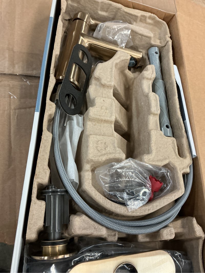 Condition photo showing As Is for moen meena bronzed gold one-handle single hole modern bathroom sink faucet with optional deckplate and drain assembly, 84794bzg