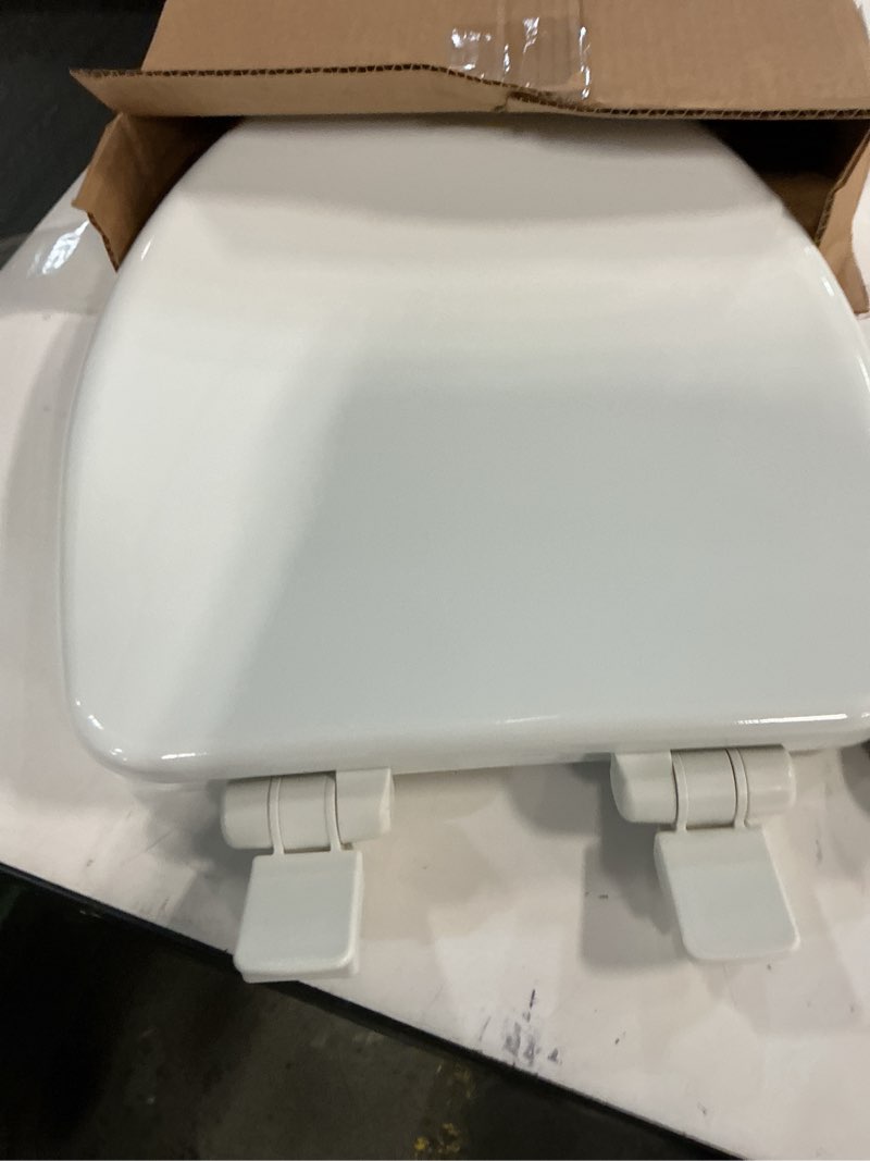 Condition photo showing As Is for Mayfair Alesio II Slow Close Toilet Seat, Easy Clean Hinges and Adjustable Perfect Fit Wood Seat, Made in USA, Elongated, White Elongated White