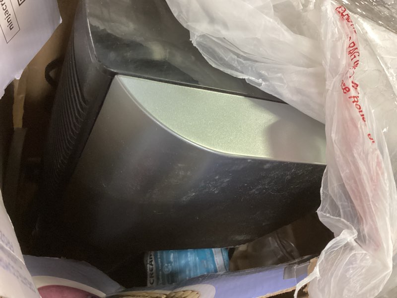 Condition photo showing As Is for Ninja NC301 CREAMi Ice Cream Maker, for Gelato, Mix-ins, Milkshakes, Sorbet, Smoothie Bowls & More, 7 One-Touch Programs, with (2) Pint Containers & Lids, Compact Size, Perfect for Kids, Silver