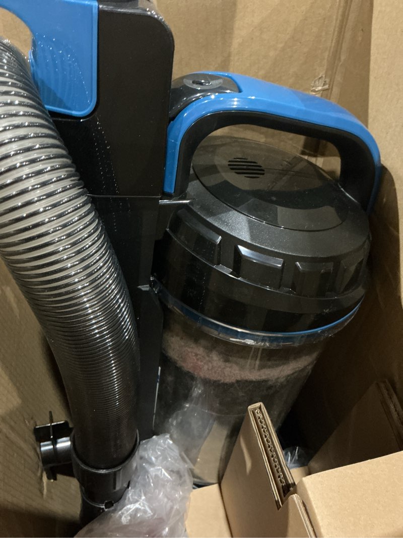 Condition photo showing As Is for (used)eureka max swivel deluxe upright vacuum, swivel steering, extended reach, quick release handle, black and blue