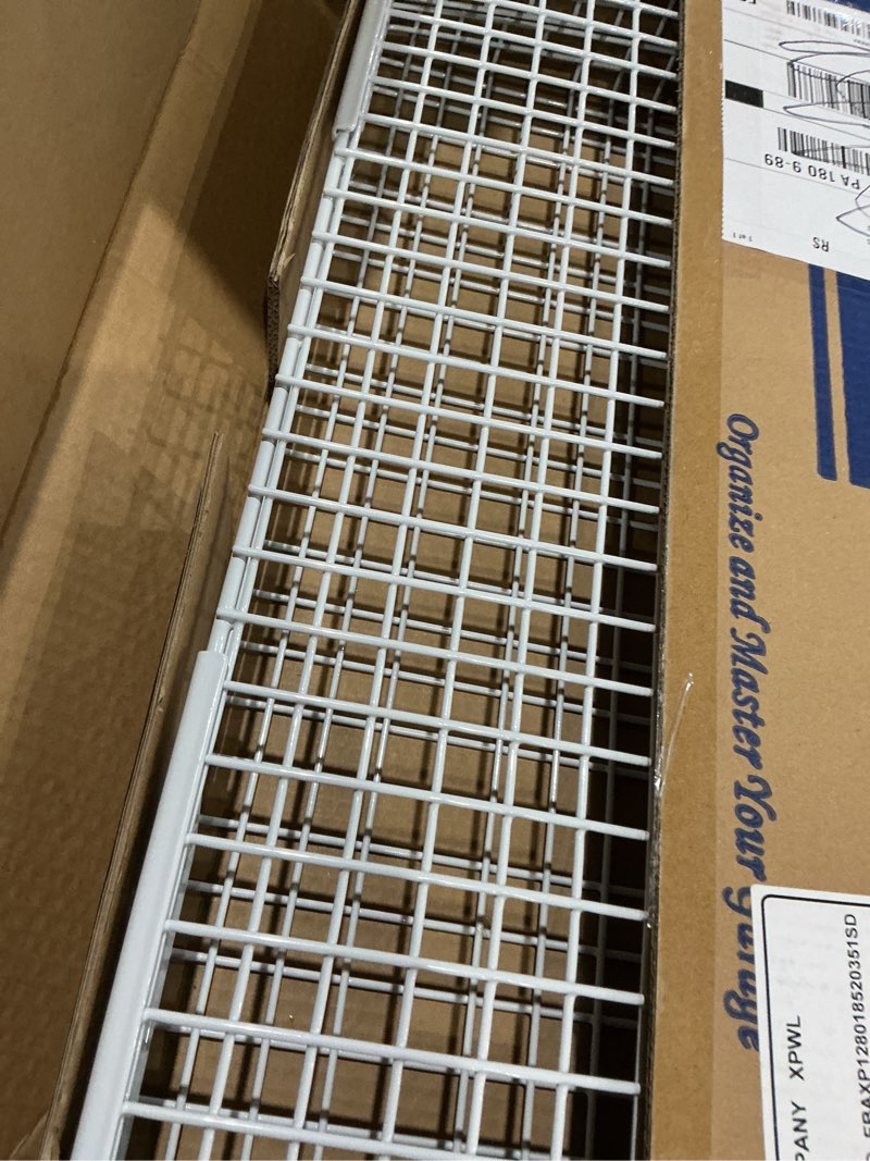 Condition photo showing Good Condition for wallmaster heavy duty garage wall shelving 2 pack 23.6"x11.8" metal wire shelves wall mount mesh storage rack for garage, office, basement and kithcen, max load 65 lbs (white) white 2pack