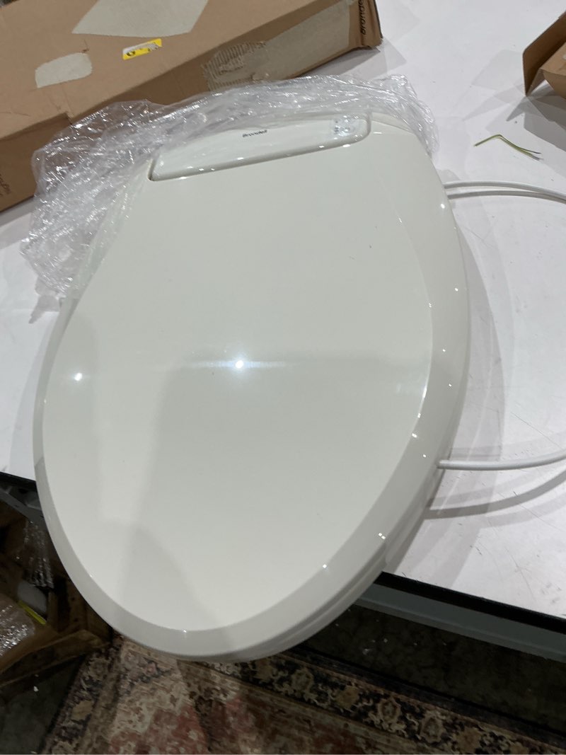 Condition photo showing Good Condition for brondell l60-eb lumawarm heated nightlight elongated toilet seat, biscuit biscuit elongated
