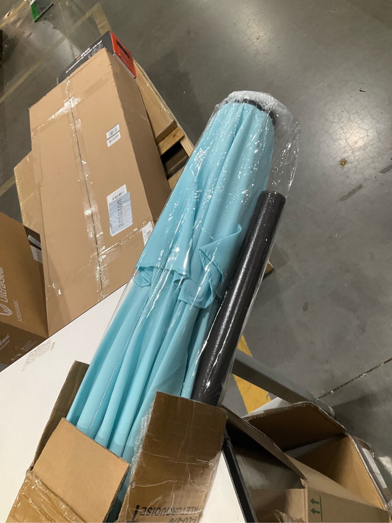 Condition photo showing Good Condition for blissun 9' outdoor patio umbrella, outdoor table umbrella, yard umbrella, market umbrella with 8 sturdy ribs, push button tilt and crank pale turquoise