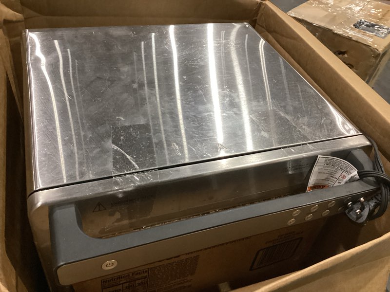 Condition photo showing As Is for ninja air fryer & toaster oven | prestige smart xl countertop oven | bakes up to 20 cookies, fits up to a 12lb turkey | pizza, toast, bake, air fry & reheat | 1800 watts | stainless steel | dt501? stainless 10-in-1