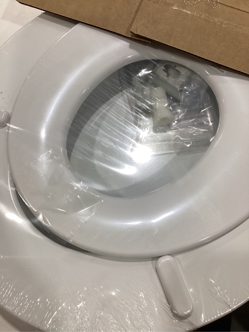 Condition photo showing Good Condition for Mayfair NextStep2 Toilet Seat with Built-In Potty Training Seat, Slow-Close, Removable that will Never Loosen, Round, White Round (1-Pack) 1-Pack