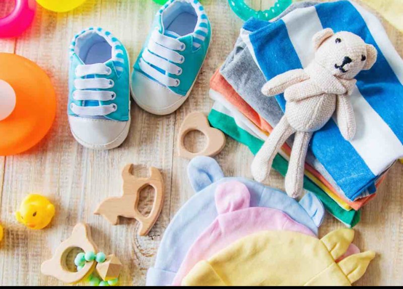 assorted lot of baby items (baby clothes, baby accessories, baby toys)
