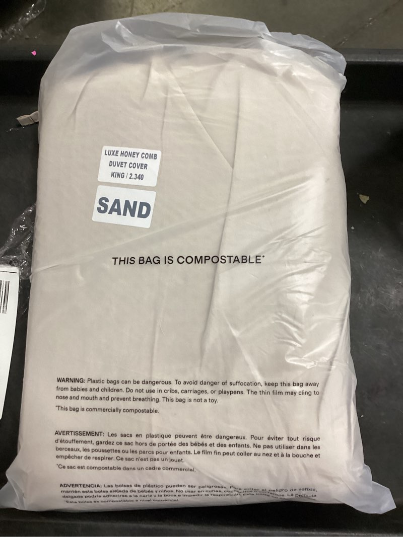 Condition photo showing New/Like New for luxe honeycomb duvet cover, sand, king