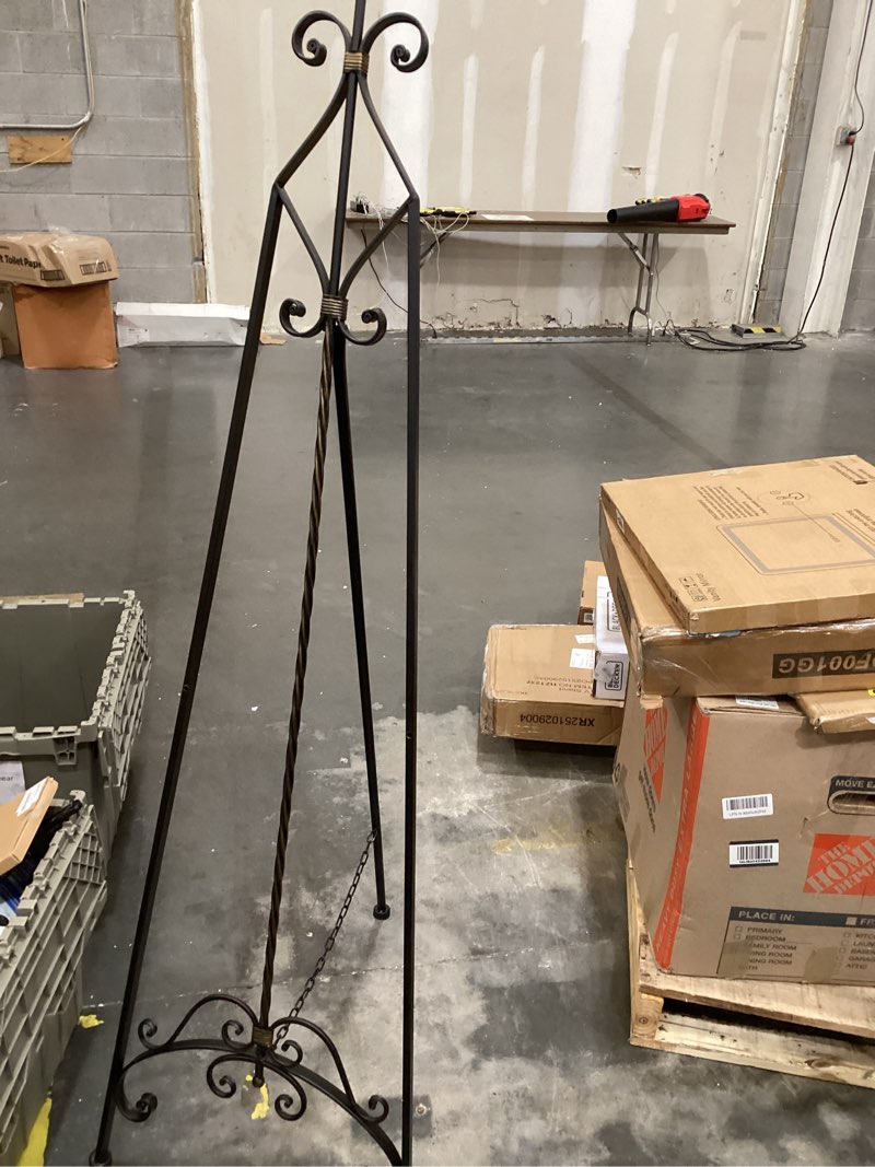 Condition photo showing Good Condition for deco 79 metal scroll display easel tall adjustable floor standing easel with gold accents, display stand 21" x 27" x 65", black black 21" x 27" x 65"