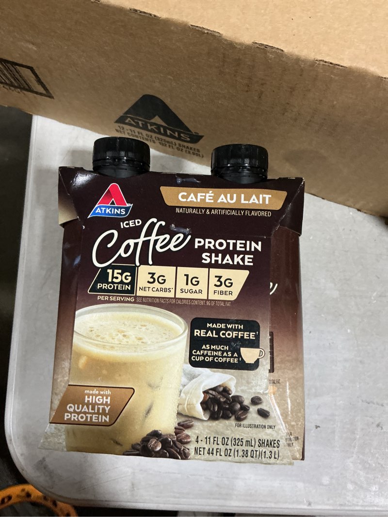 Condition photo showing New/Like New for Atkins Café au Lait Iced Coffee Flavored Protein Shake, High Protein Shake, Low Sugar, Low Carb and Low Sugar, Keto Friendly, Gluten Free, 12 Count Café Au Lait 1 Fl Oz (Pack of 1)