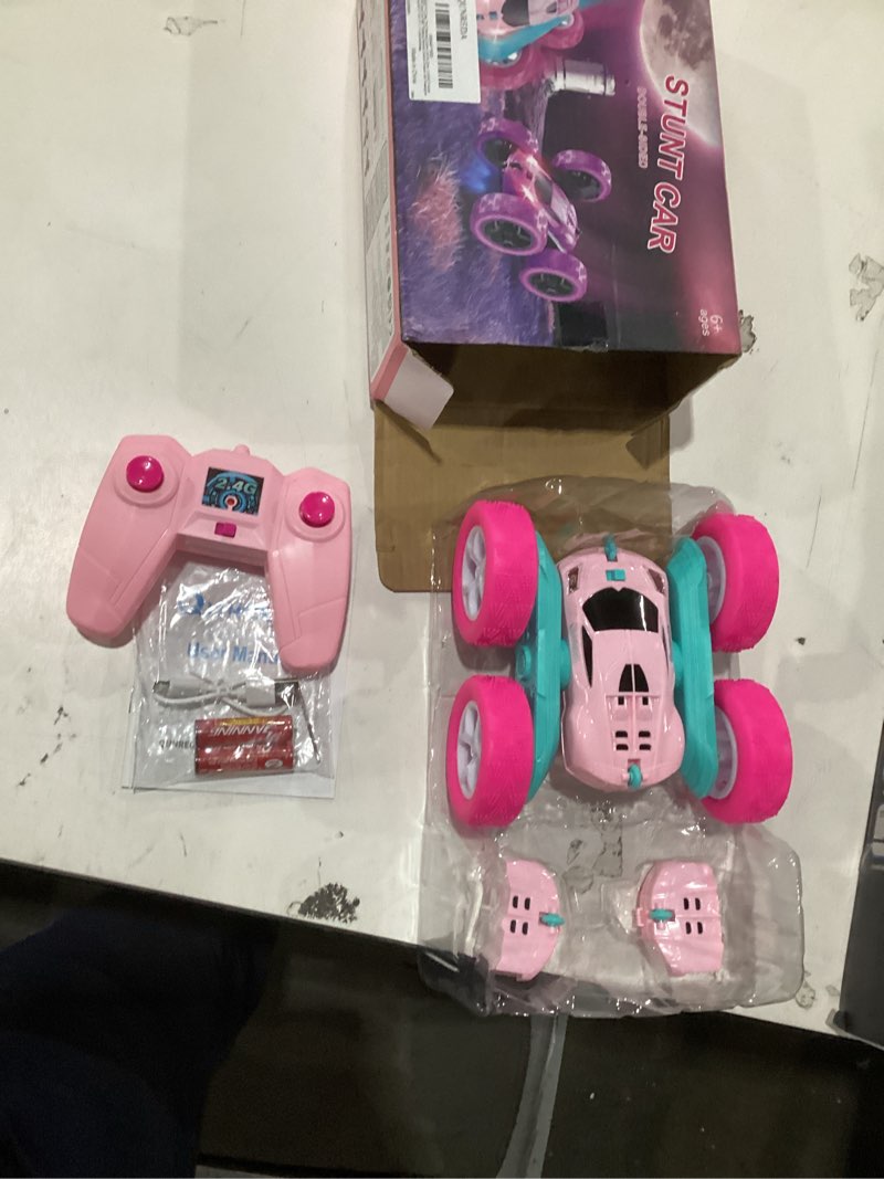 Condition photo showing Good Condition for RC Cars, Pink Remote Control Car for Girls, 2.4 GHZ Double Sided RC Stunt Car 360° Rotating Remote Control Crawler with Headlights Car Toys for 6 7 8 9 10 11 12 Girls Birthday Gift Grandkids