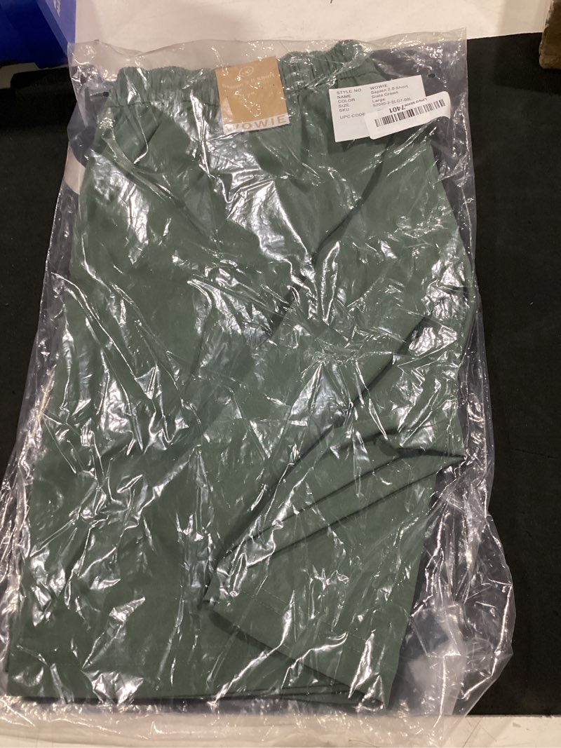 Condition photo showing New/Like New for (large) wowie mens sapien 2.0 shorts, 7'' inseam stretch shorts, elastic waistband, anti-wrinkle material, signature pocket accents slate green small