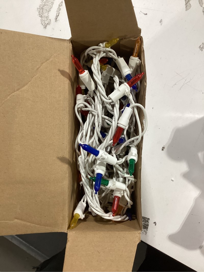 Condition photo showing As Is for GE 150 Count StayBright Multicolor Multi Color LED Christmas Icicle Lights with White Wire