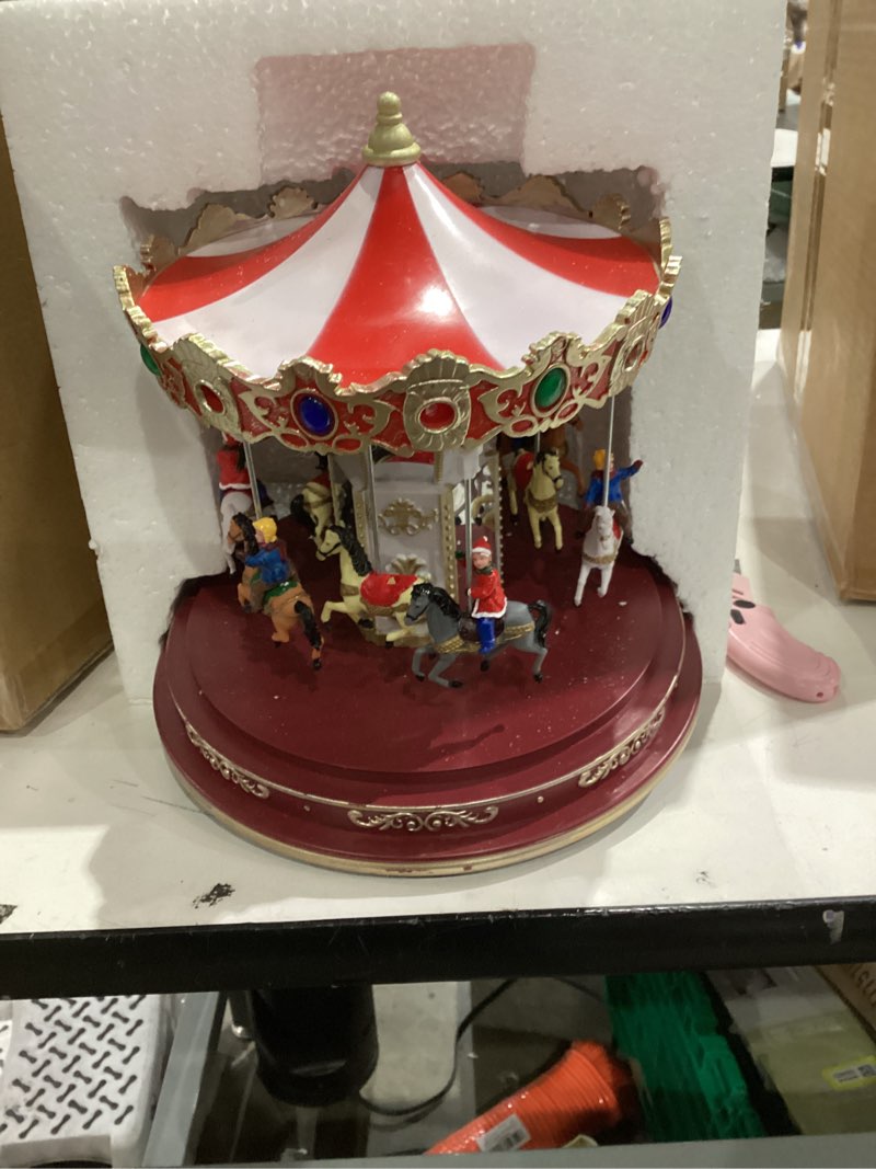 Condition photo showing As Is for Christmas Village Carousel Decoration Multicolor Music Box with LED Light Beautiful Building Collection for Kids Gift