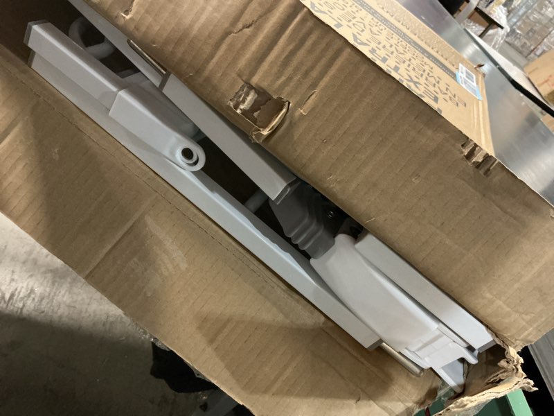 Condition photo showing As Is for regalo easy step 49-inch extra wide baby gate, includes 4-inch and 12-inch extension kit, 4 pack of pressure mount kit and 4 pack of wall mount kit white 29-49"w x 30"h