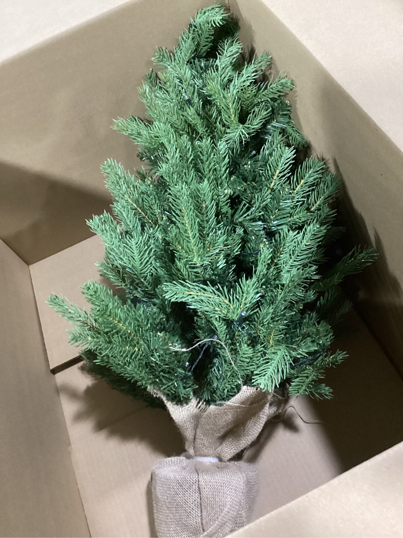 Condition photo showing Good Condition for 3ft Pre-Lit Mini Fir Christmas Tree,Artificial Pine Xmas Tree,106 PE Branches Tips & 84 PVC Branches Tips & UL Certification LED Lights & Burlap Wrapped Base for Tabletop Desk,Battery Operated