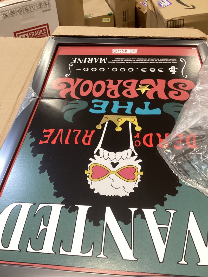 Condition photo showing As Is for one piece - brook wanted poster wall poster, 22.4l" x 14.7w", black framed version black framed version 22.4"l x 14.7"w
