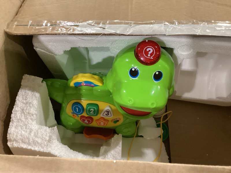 Condition photo showing As Is for vtech chomp and count dino, green